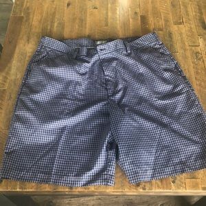 Navy blue golf shorts.